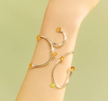Bracciale rigido bold in argento con cristalli di topazio e opale