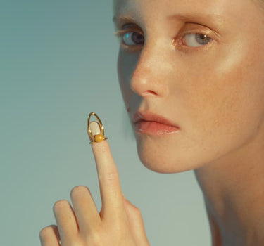 Gold Nail Ring with Embedded Stone