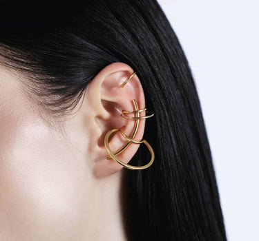 set of ear cuffs and ear climber in gold