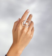 Silver circular ring with white quartz