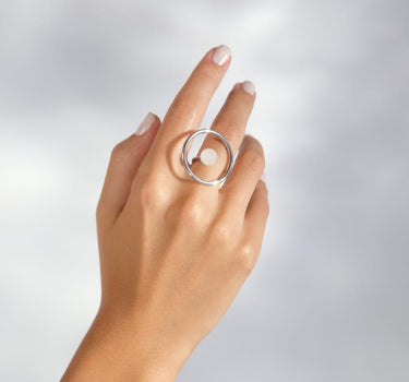 Silver circular ring with white quartz