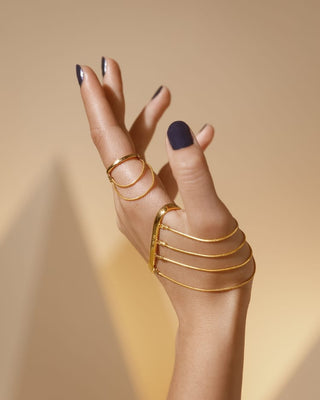 Gold wrap around ring set with chains