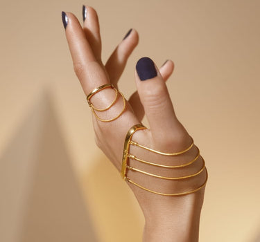 Gold wrap around ring set with chains