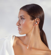 Silver ear cuff and earring with white quartz